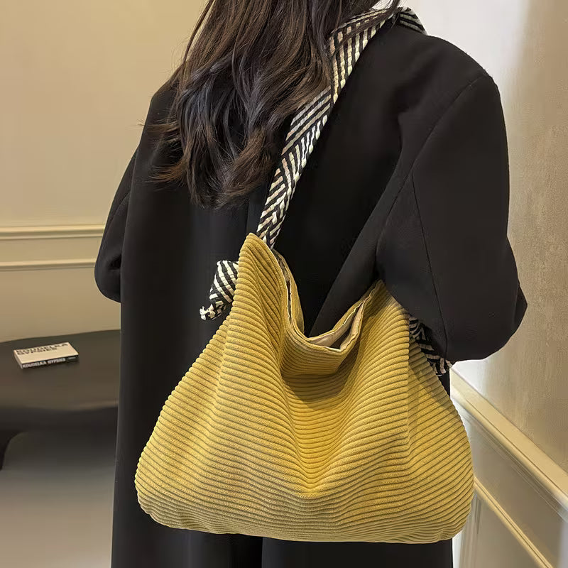 Elegant Soft Shoulder Bag with Wide Comfort Strap.