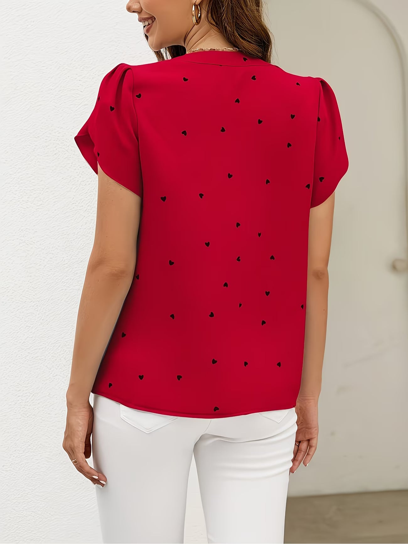 Heart-Print V-Neck Shirt.