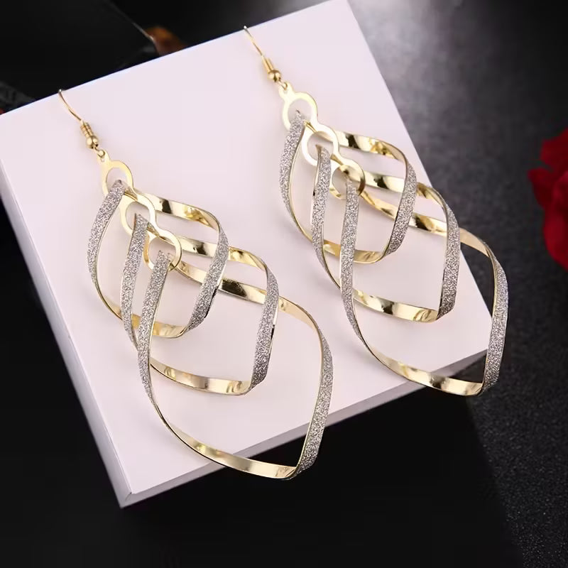 Long Spiral Three-Dimensional -Shaped Sequined Tassel Earrings.