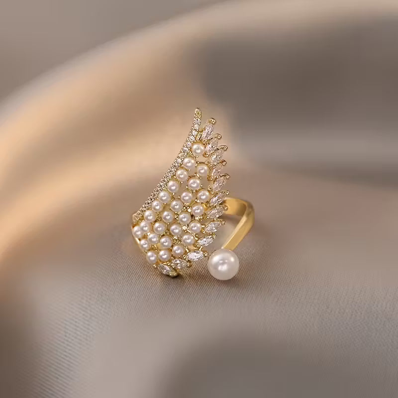 Micro-Inlaid Synthetic Zirconia And Faux Pearl Wings Rings.