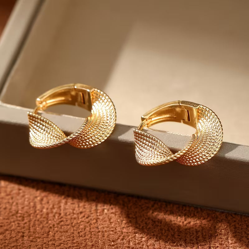 Pair of European And American Fashion Woven Wave Earrings.