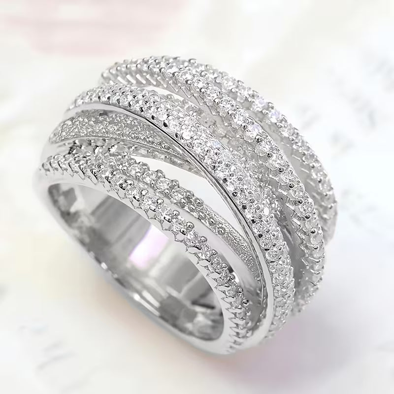 Stylish Sparkling Synthetic Zirconia Braided Wide Ring.