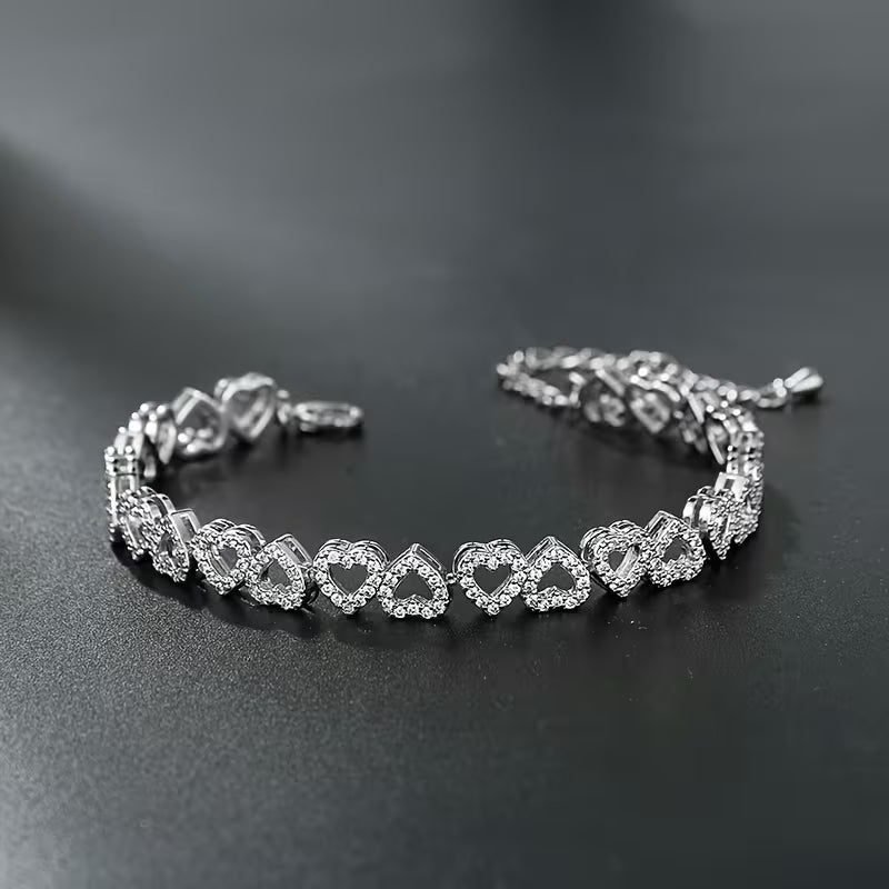 Cubic Synthetic Zirconia Heart Tennis Bracelets.