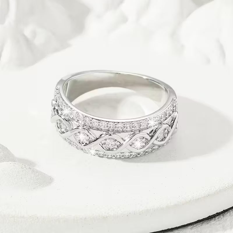 Delicate Infinite Symbol Inlaid Zirconia Eternity Rings.