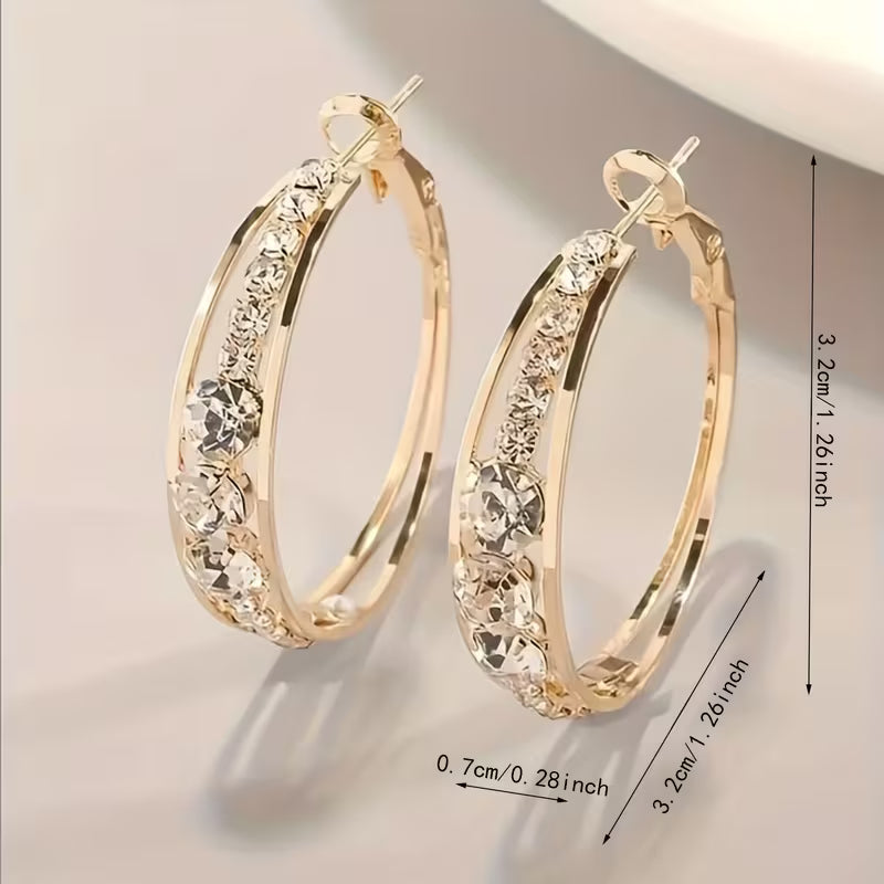 Elegant Golden Halo Hollow Round Zirconia Earrings.