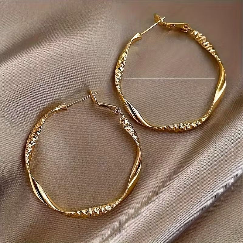 Elegant Textured  Golden Twisted Hoop Earrings.