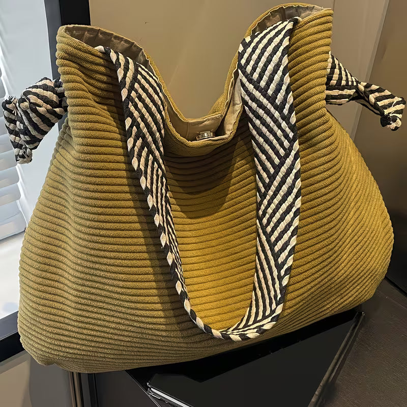 Elegant Soft Shoulder Bag with Wide Comfort Strap.
