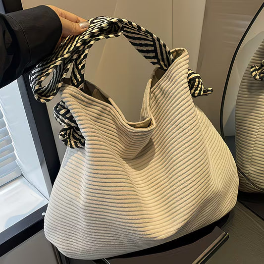 Elegant Soft Shoulder Bag with Wide Comfort Strap.