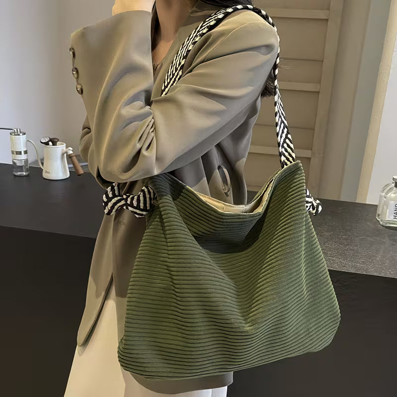 Elegant Soft Shoulder Bag with Wide Comfort Strap.