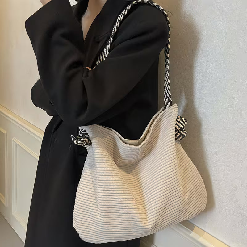 Elegant Soft Shoulder Bag with Wide Comfort Strap.