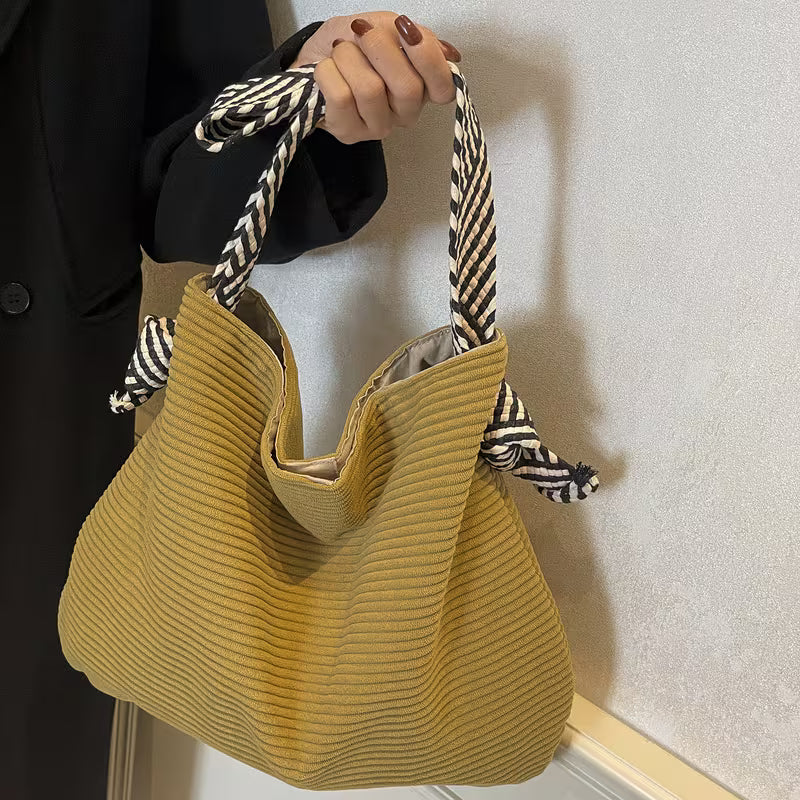 Elegant Soft Shoulder Bag with Wide Comfort Strap.