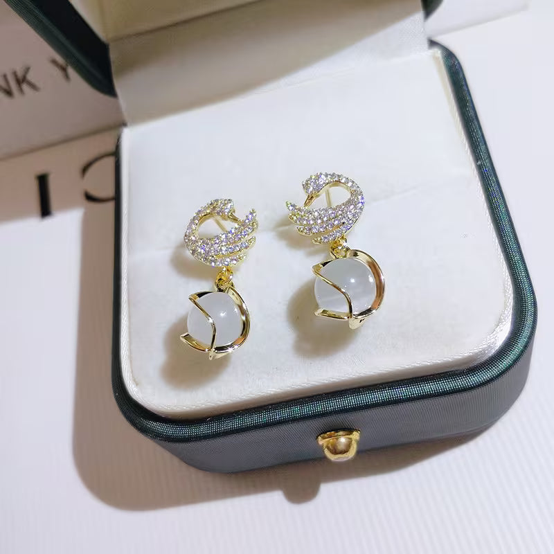 Exquisite Fashion and Creative Swan Eye Pendant Earrings.