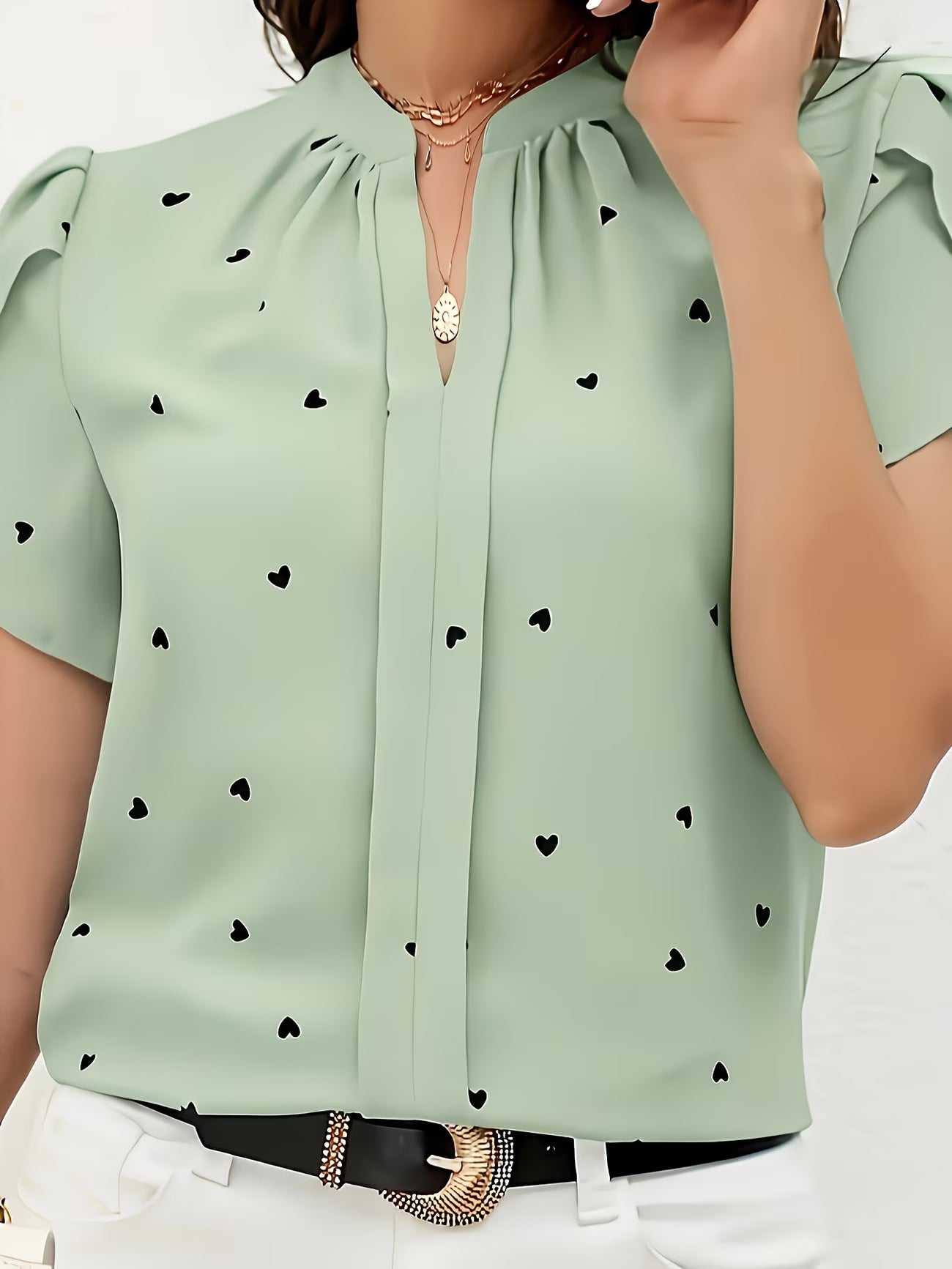 Heart-Print V-Neck Shirt.