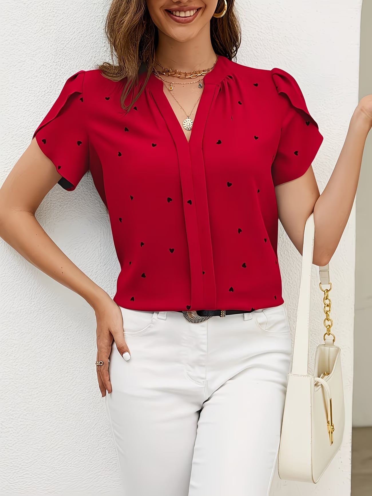 Heart-Print V-Neck Shirt.