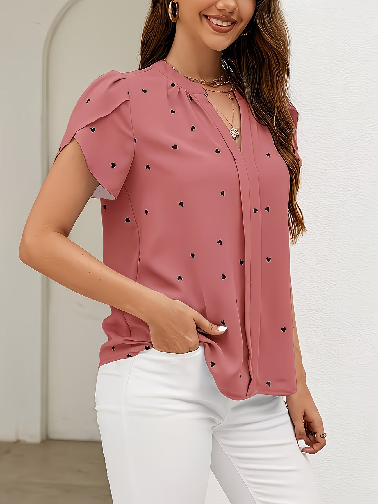 Heart-Print V-Neck Shirt.
