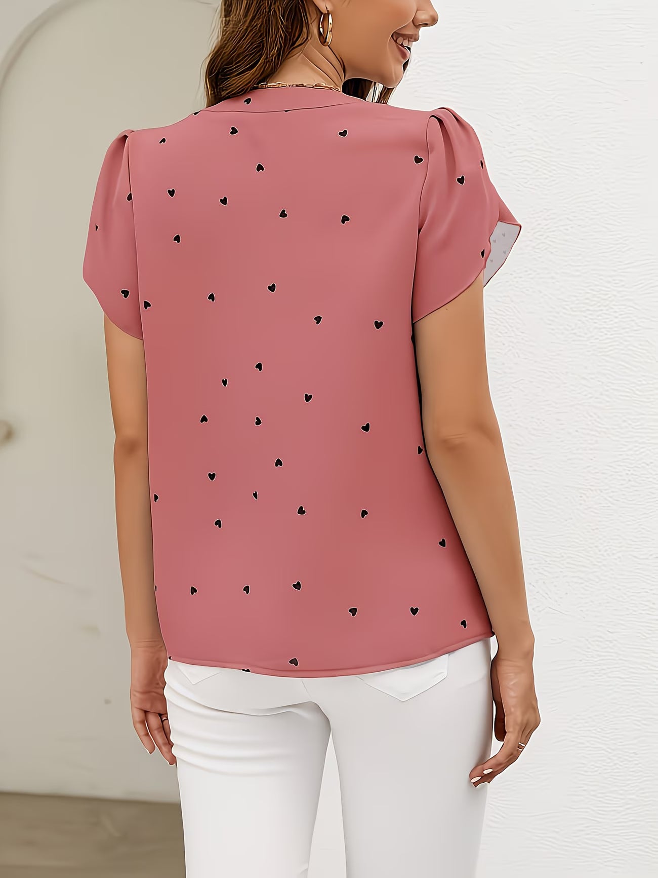 Heart-Print V-Neck Shirt.