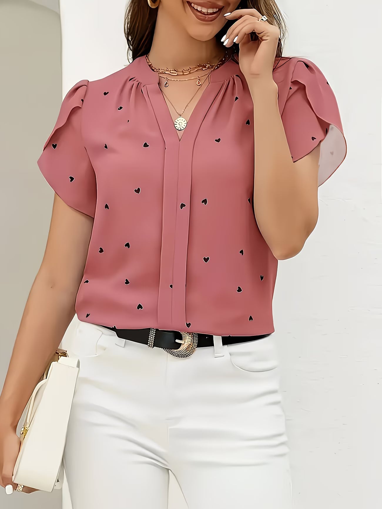 Heart-Print V-Neck Shirt.
