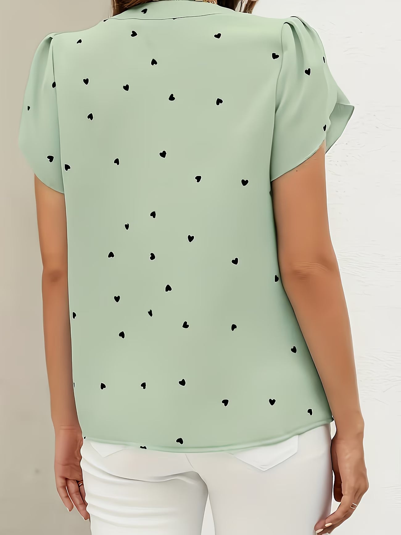 Heart-Print V-Neck Shirt.