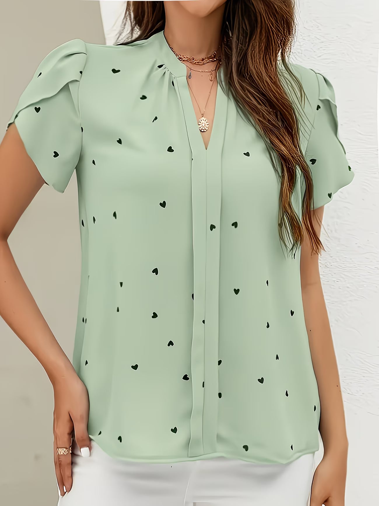 Heart-Print V-Neck Shirt.