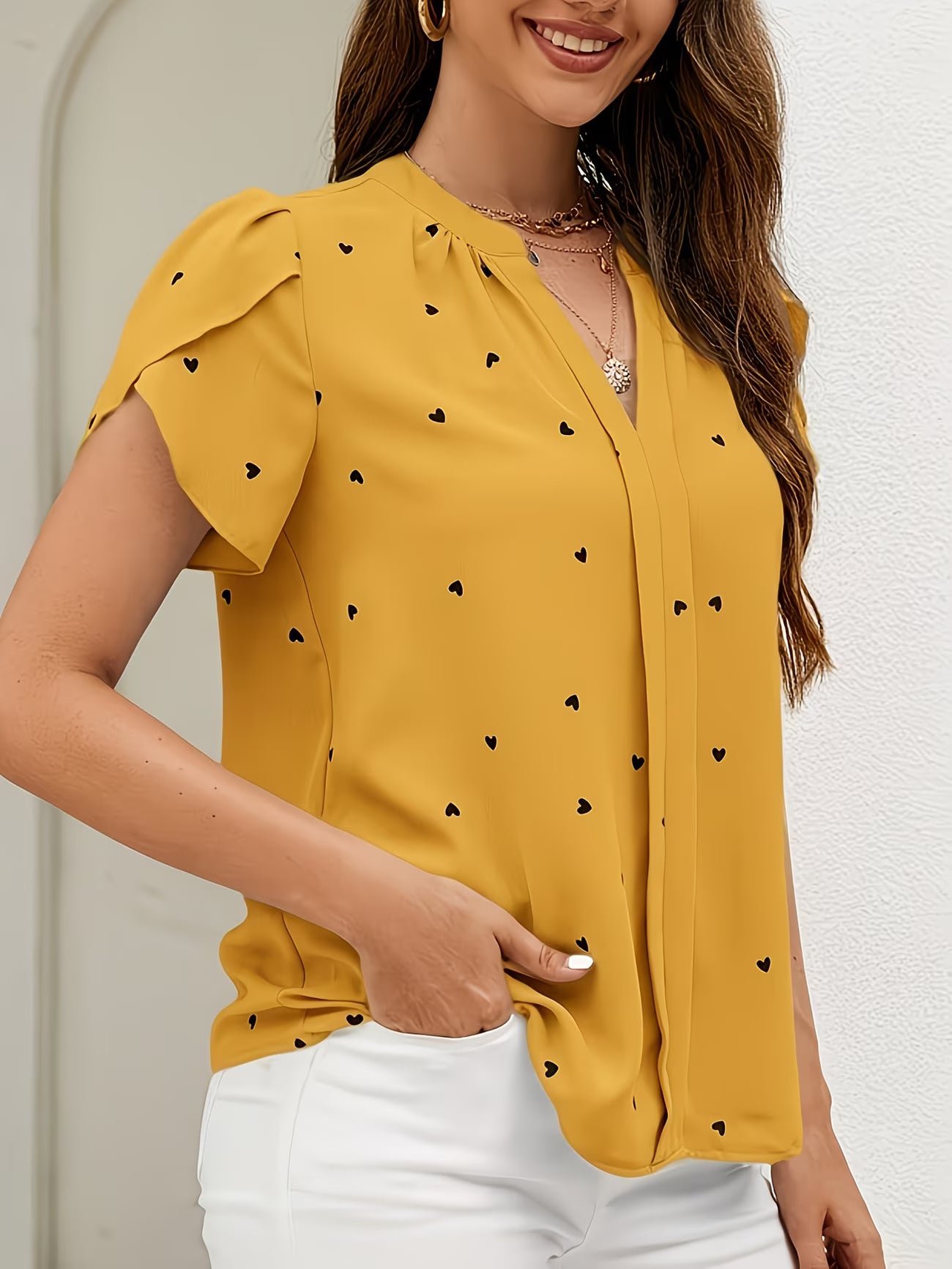 Heart-Print V-Neck Shirt.
