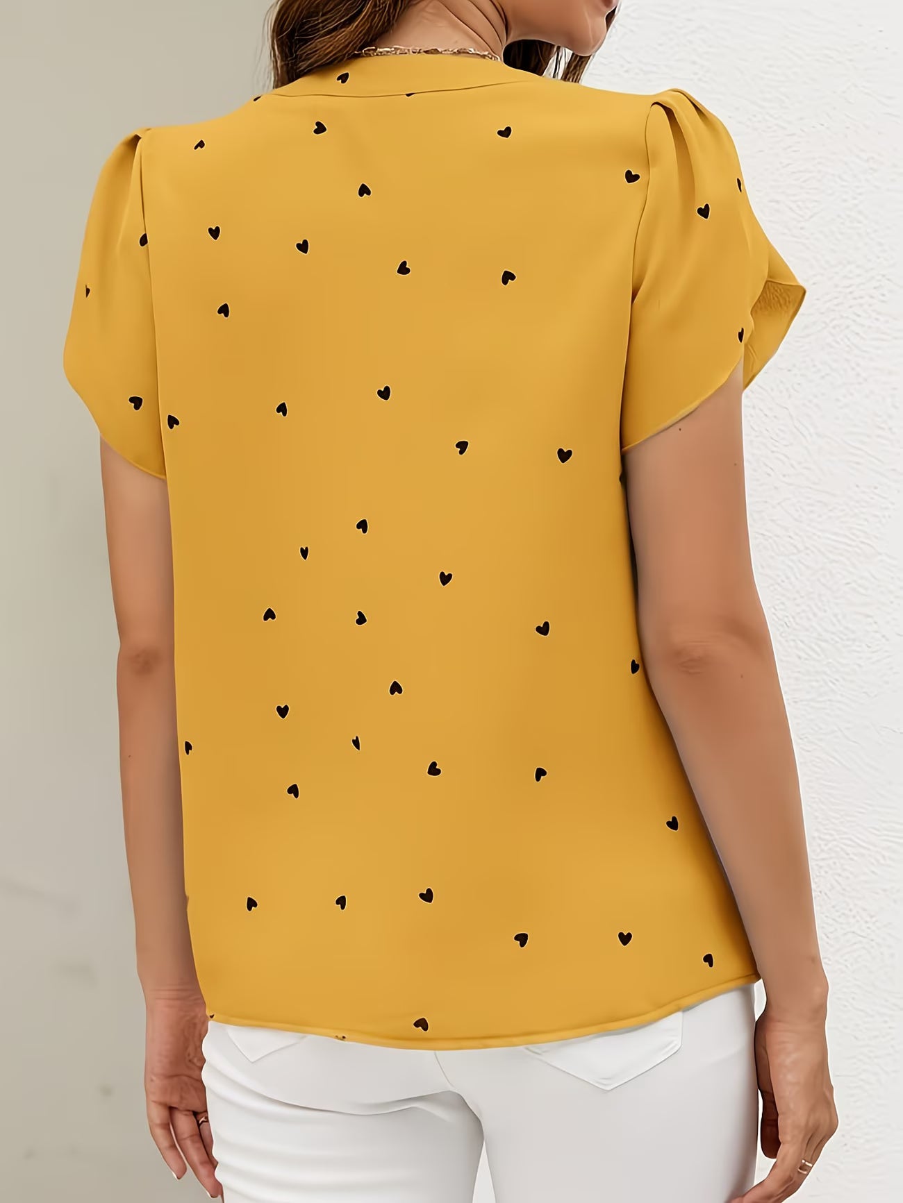 Heart-Print V-Neck Shirt.