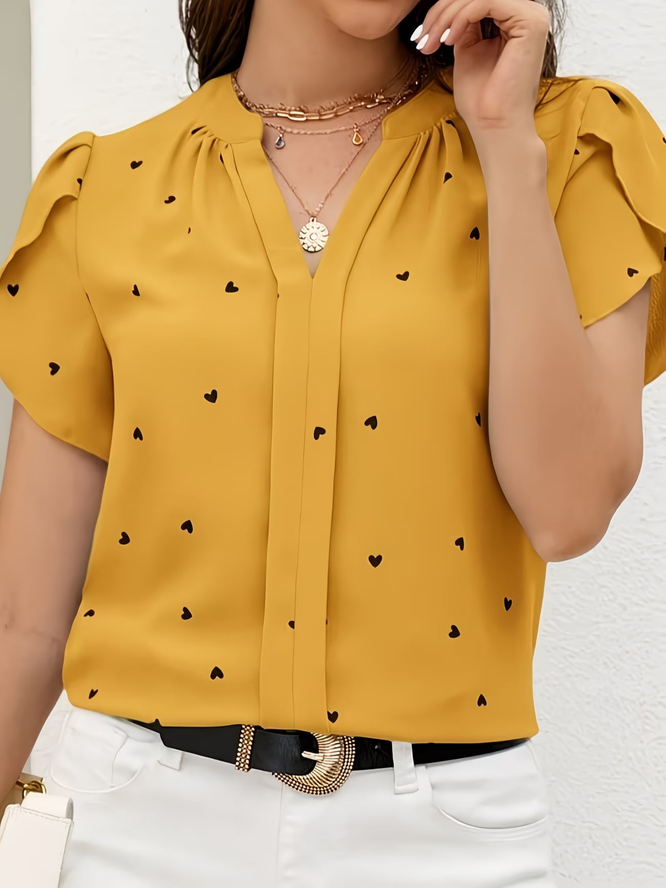 Heart-Print V-Neck Shirt.