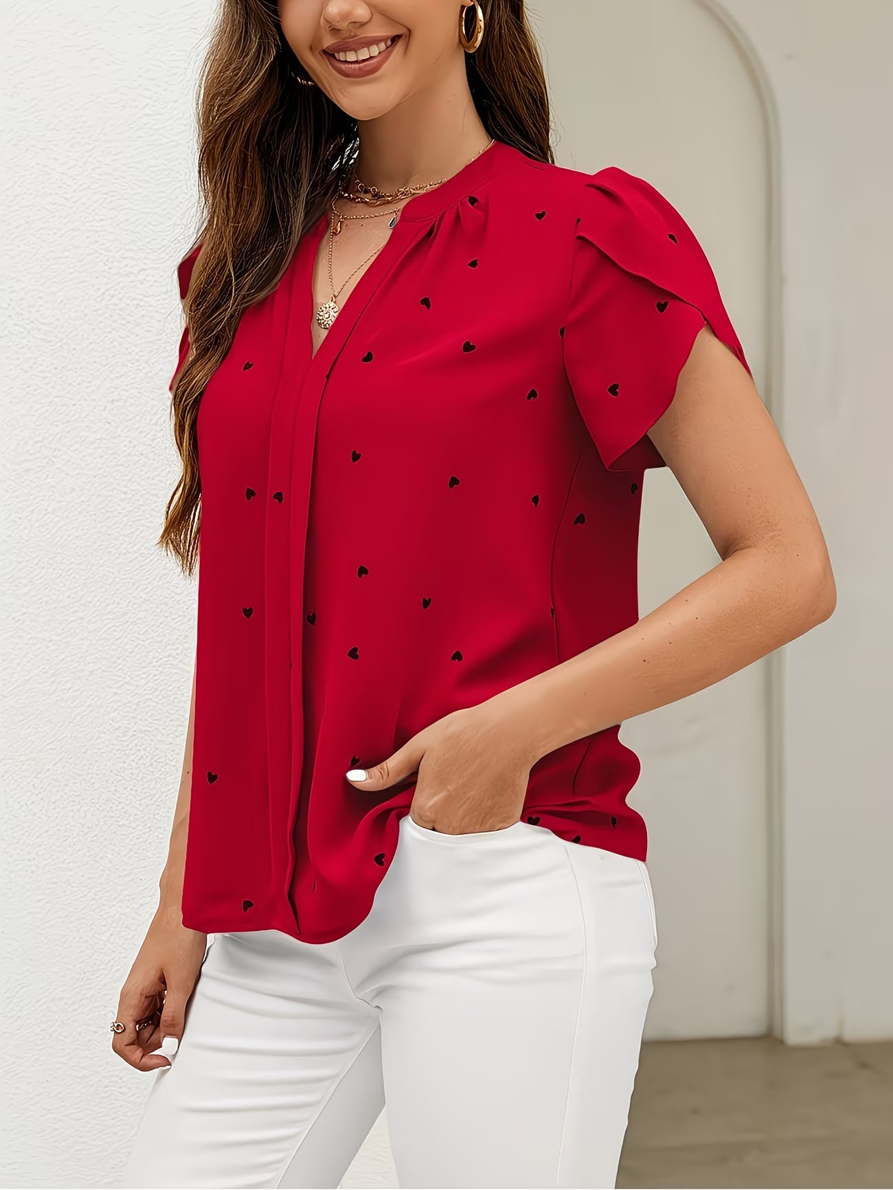 Heart-Print V-Neck Shirt.
