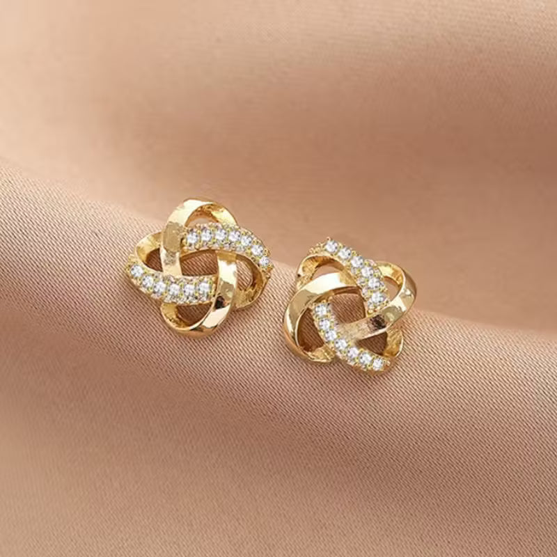 Hollow Stud Earrings with Shiny Inlaid K Plating.