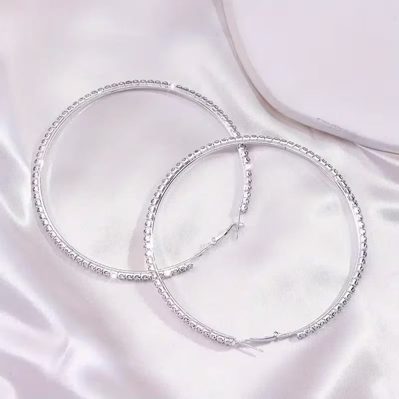 Large Rhinestone-Encrusted Statement Hoops.