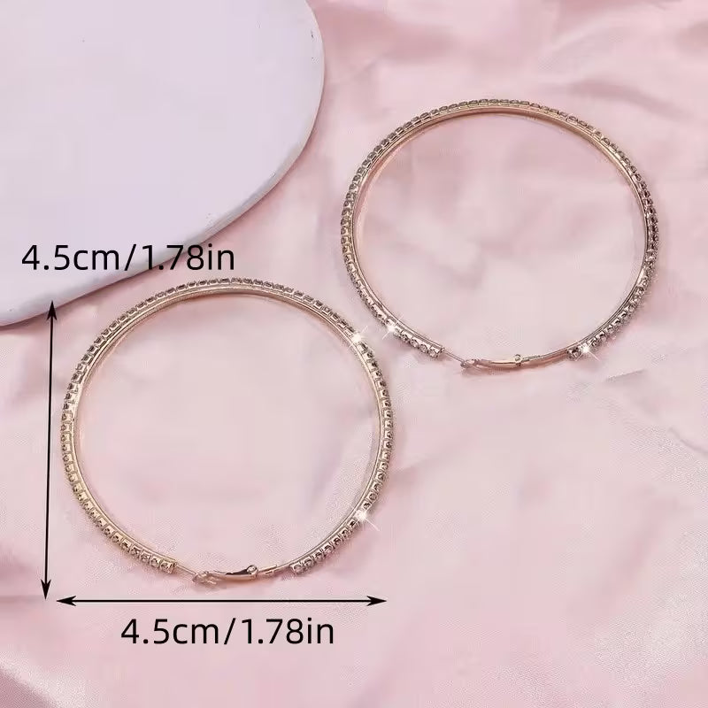 Large Rhinestone-Encrusted Statement Hoops.