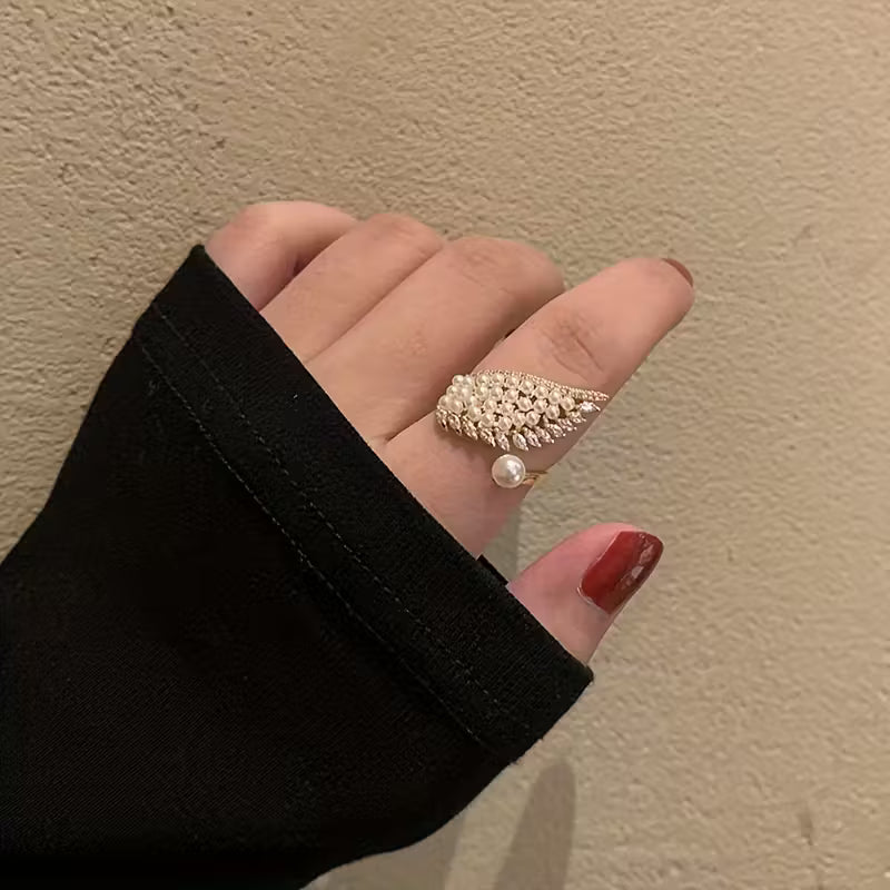 Micro-Inlaid Synthetic Zirconia And Faux Pearl Wings Rings.