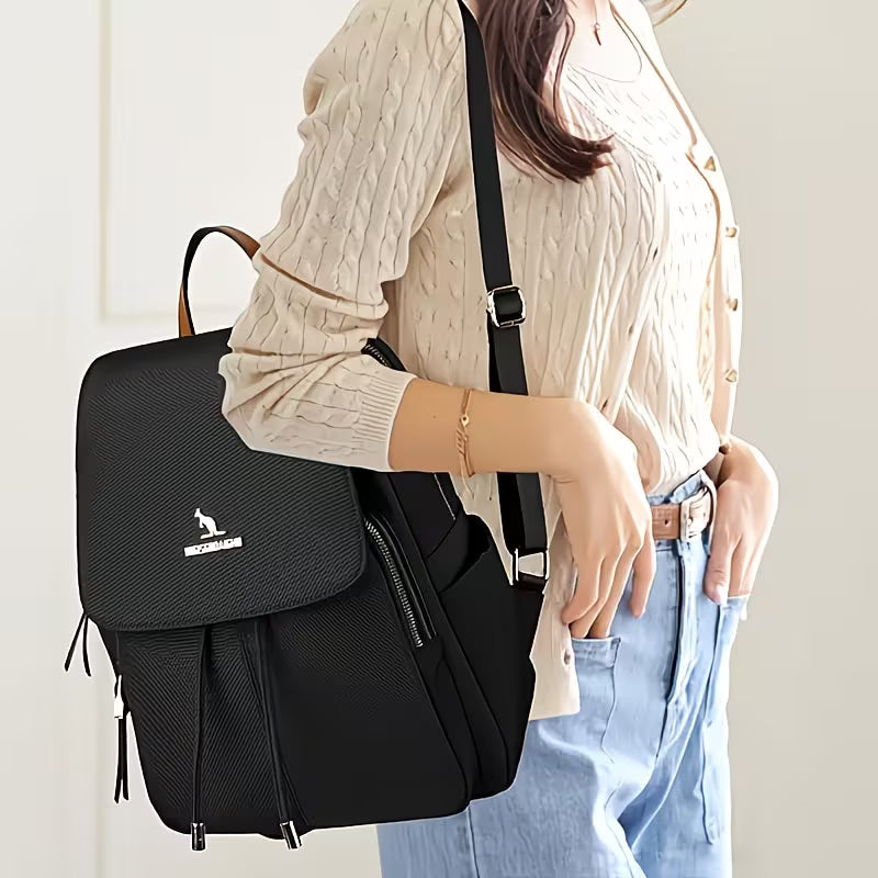 Minimalist Golden-Accent Backpack.