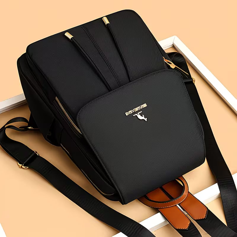 Minimalist Golden-Accent Backpack.