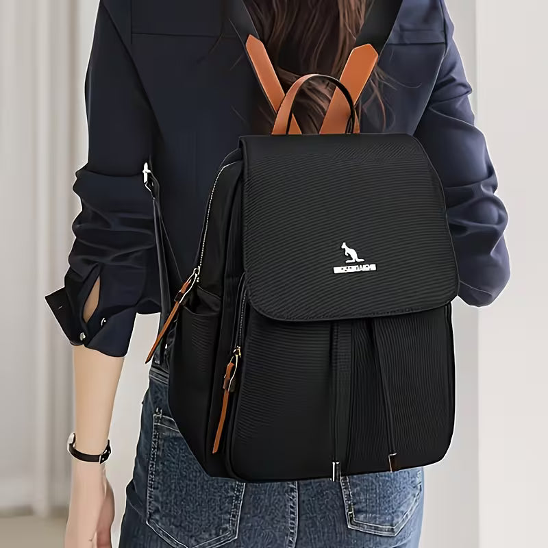 Minimalist Golden-Accent Backpack.