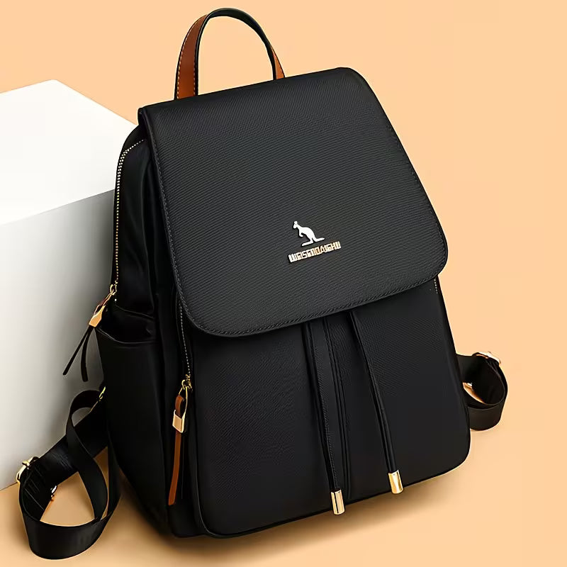 Minimalist Golden-Accent Backpack.