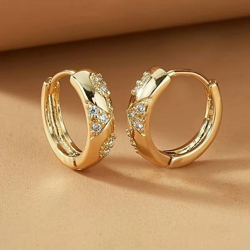 Pair of Elegant Circular Carved Patterns Earrings.