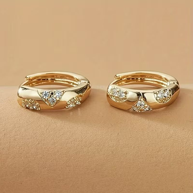 Pair of Elegant Circular Carved Patterns Earrings.