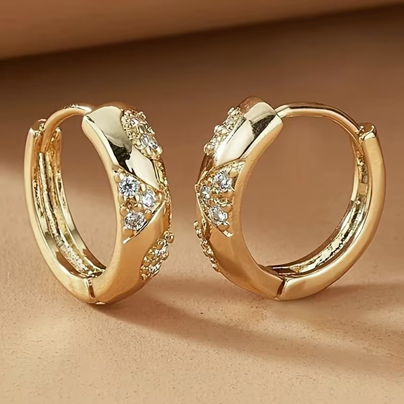 Pair of Elegant Circular Carved Patterns Earrings.