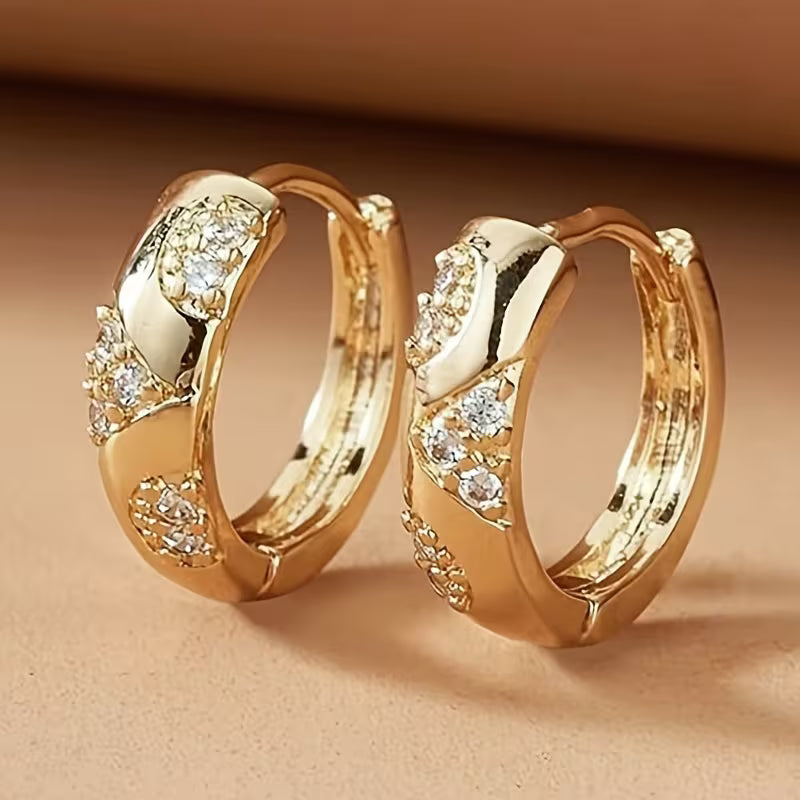 Pair of Elegant Circular Carved Patterns Earrings.
