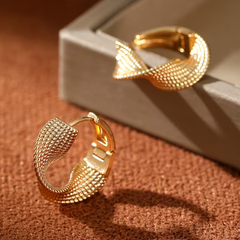 Pair of European And American Fashion Woven Wave Earrings.