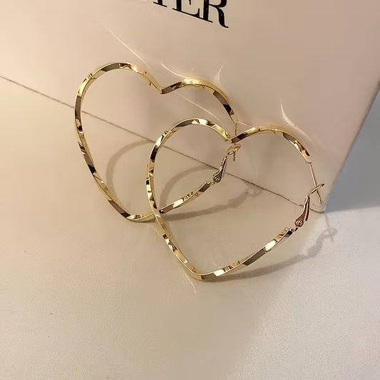Pair of Women'S Stylish Heart-Shaped Twisted Design Hoop Earrings.
