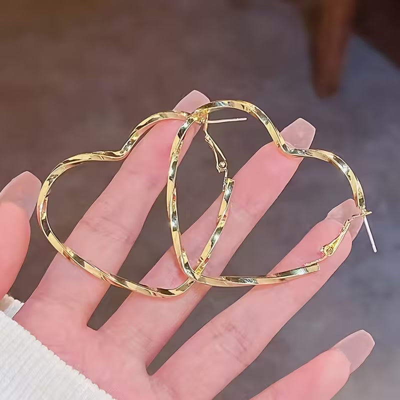 Pair of Women'S Stylish Heart-Shaped Twisted Design Hoop Earrings.