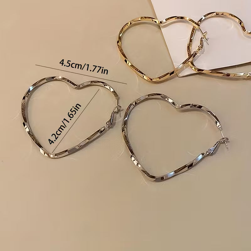 Pair of Women'S Stylish Heart-Shaped Twisted Design Hoop Earrings.