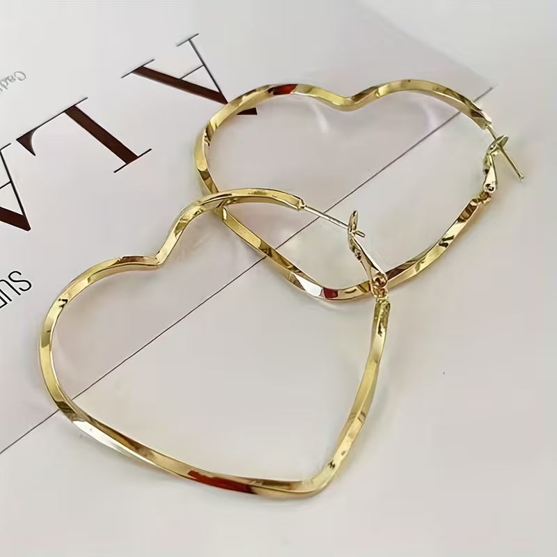 Pair of Women'S Stylish Heart-Shaped Twisted Design Hoop Earrings.