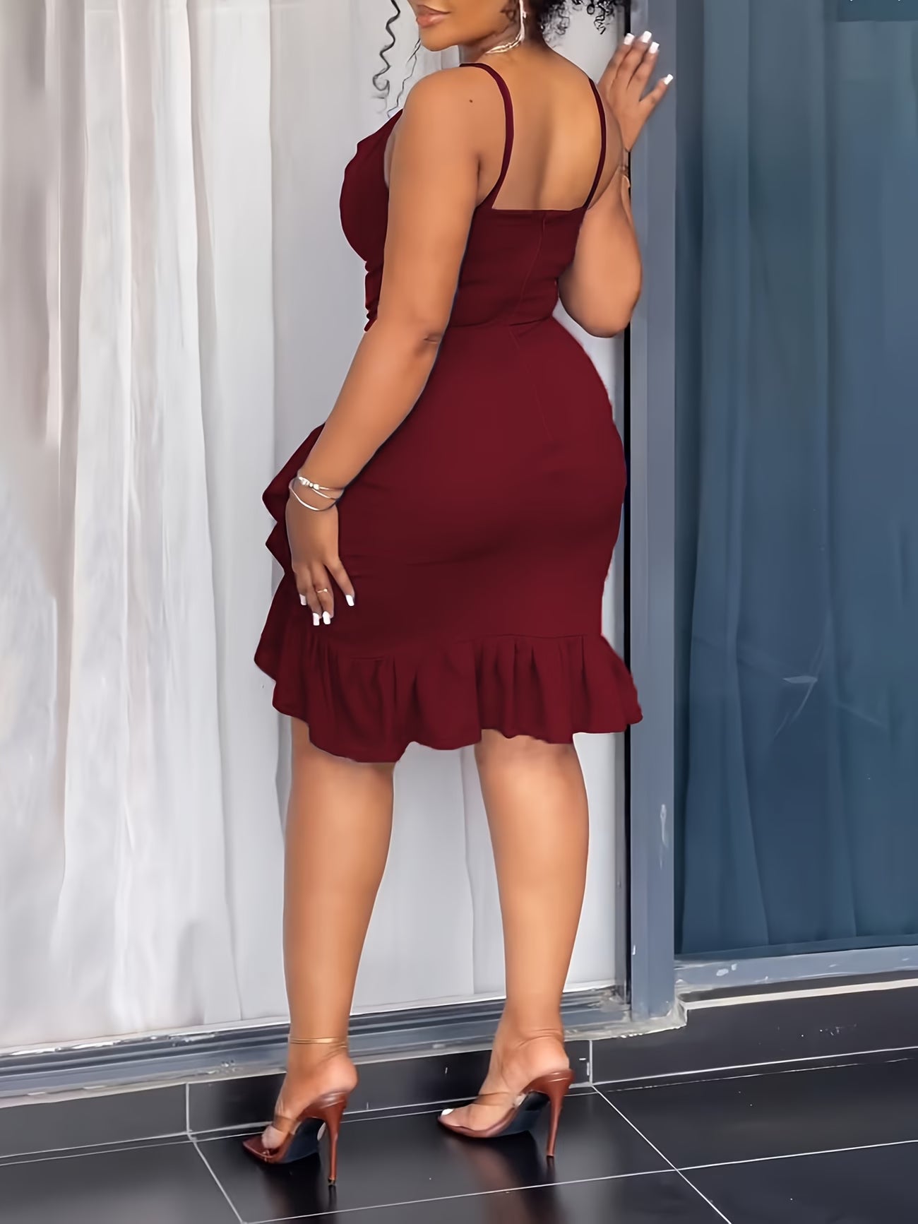 Sleeveless Dress with Ruffled Hem And Back Zipper.