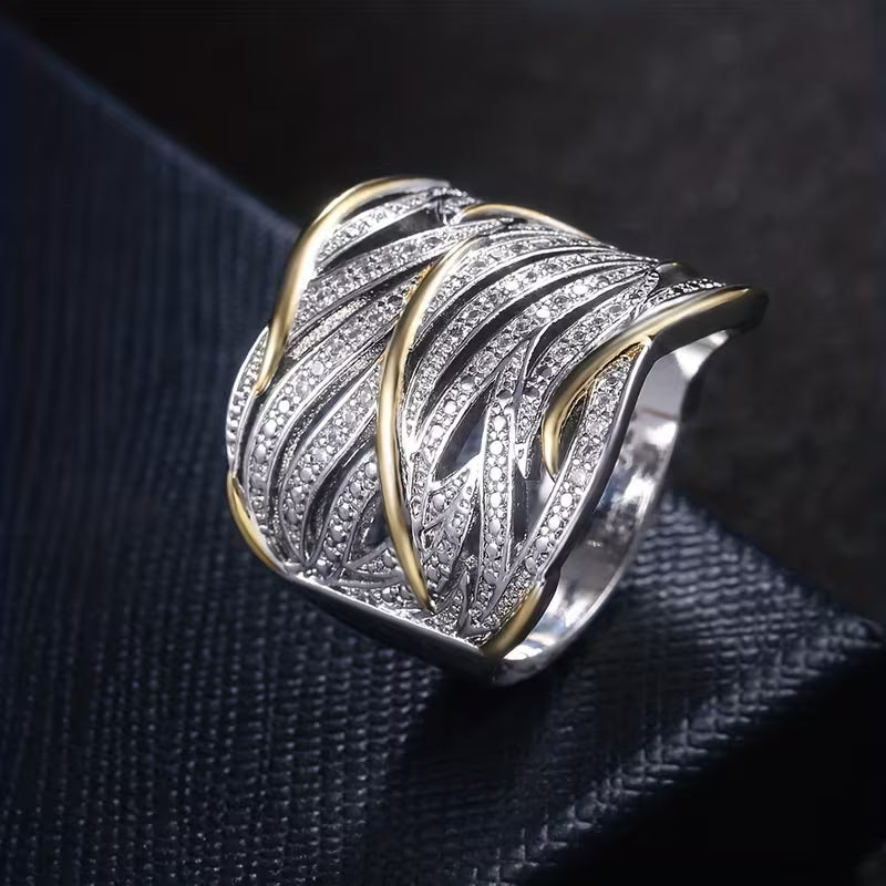 Sparkling Zirconia in a silvery Leaf Pattern Stylish Broad Rings.