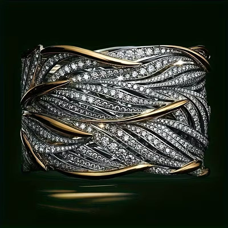 Sparkling Zirconia in a silvery Leaf Pattern Stylish Broad Rings.