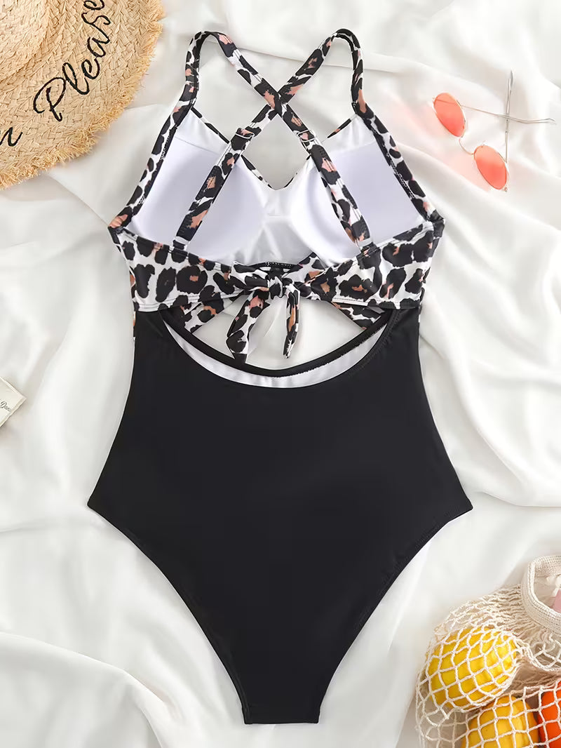 Striped Cut-Out One-Piece Swimsuit.