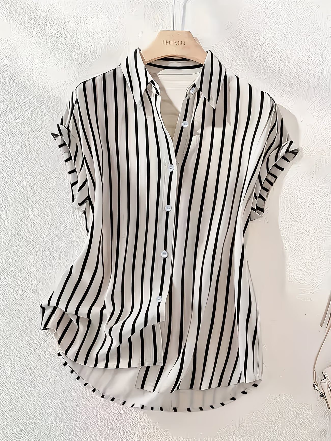 Striped Drop-Shoulder Polo Shirt.