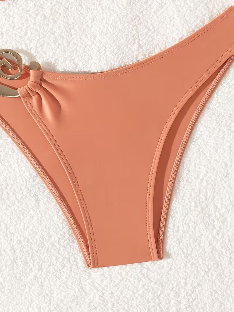 Two-Piece Swimsuit with Metal Accents.